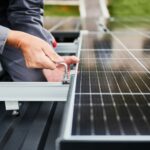 Professional installation of PV system on a roof.